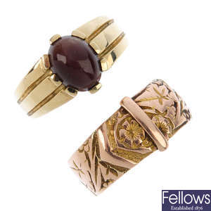An early 20th century 9ct gold buckle ring and a later 9ct gold cats-eye gem-set ring.