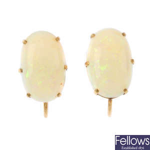 A pair of opal earrings.