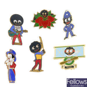 A selection of Golly brooches.