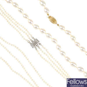 Four cultured pearl necklaces and a bracelet.