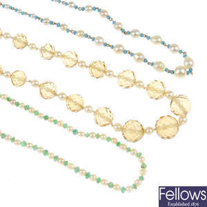 Four gem necklaces.