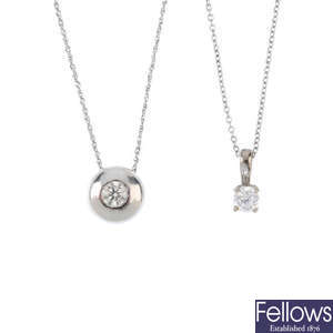 Two diamond and cubic zirconia single-stone pendants, with chains.