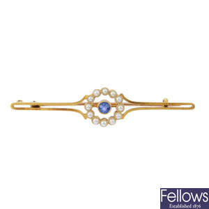An early 20th century sapphire and split pearl brooch.