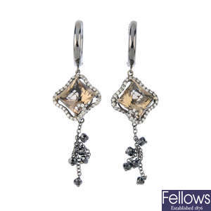 A pair of smoky quartz and diamond clip earrings