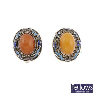 A Chinese natural amber silver gilt ring and pair of ear clips.