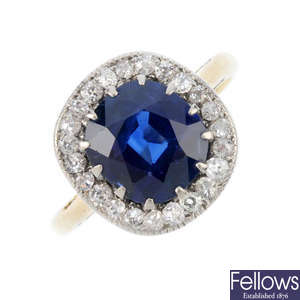 An early 20th century sapphire and diamond cluster ring.
