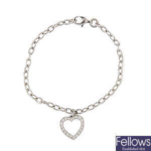 TIFFANY & CO. -  a platinum and diamond heart bracelet.