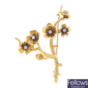 A 1960s 18ct gold diamond floral brooch.