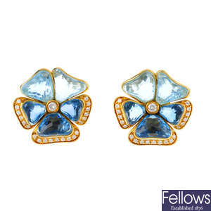 A pair of diamond, aquamarine and topaz earrings.