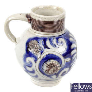 A rare early 18th century German Westerwald salt-glazed grey stoneware commemorative jug or stein.