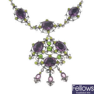 A mid 20th century purple and green paste necklace. 