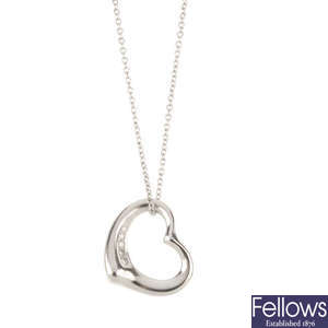 TIFFANY & CO. - a platinum and diamond 'Open Heart' pendant.