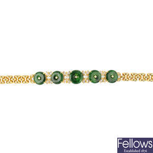 A jade and diamond bracelet.