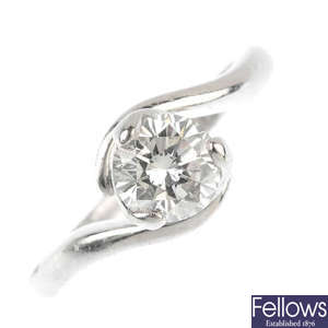 A platinum diamond single-stone crossover ring.