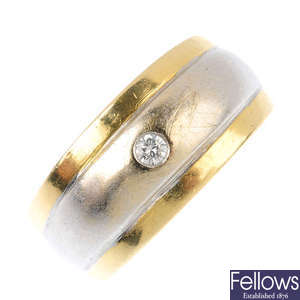 A gentleman's diamond single-stone band ring.