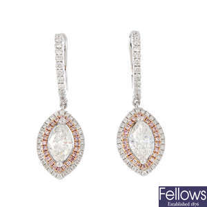 A pair of diamond and 'pink' diamond earrings.