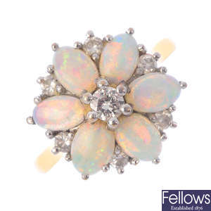 An 18ct gold opal and diamond dress ring.