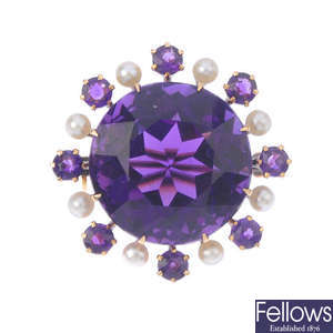 An amethyst and seed pearl brooch.
