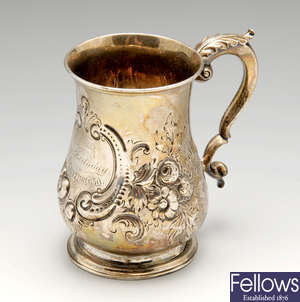 A Victorian silver mug & George II cream jug.