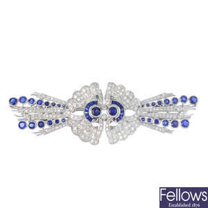 A sapphire and diamond double clip brooch.