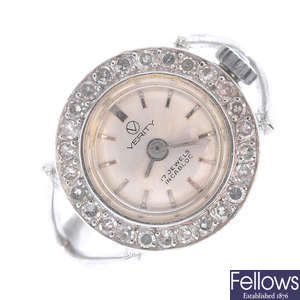 A mid 20th century manual-wind diamond ring watch.
