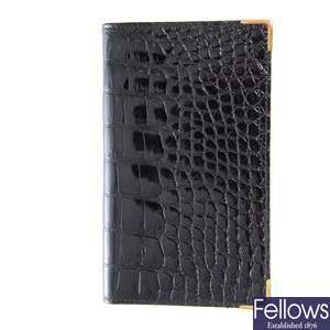 GARRARD - a black polished crocodile skin wallet.