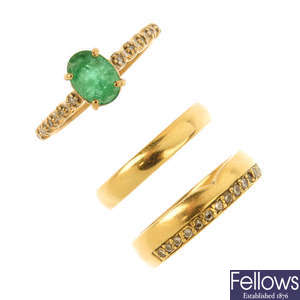 Two 18ct gold rings and a 9ct gold gem-set ring.