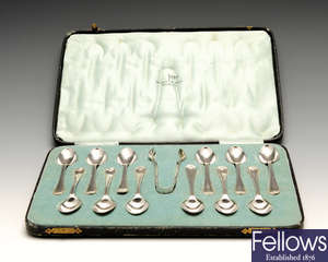 A 1930's cased set of twelve silver teaspoons.
