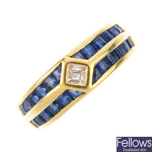 A sapphire and diamond band ring.