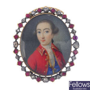 A diamond and foil-back ruby miniature portrait clasp.