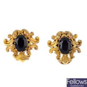 A pair of amethyst earrings.