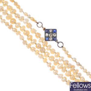 A natural saltwater pearl single-strand necklace, with sapphire and diamond clasp.