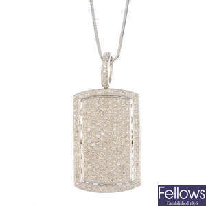 A 14ct gold diamond pendant, with chain.