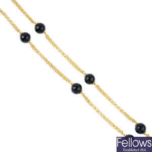 An 18ct gold onyx necklace.