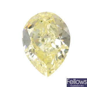 A pear-shape 'yellow' diamond, weighing 1.02cts.