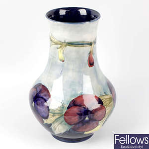 A Moorcroft vase, of bulbous form decorated in the pansy design.