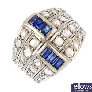 A diamond and gem-set dress ring.