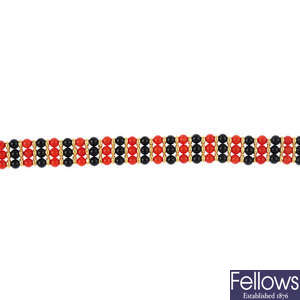 A coral and onyx bracelet.