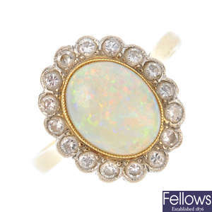 An 18ct gold diamond and opal cluster ring.