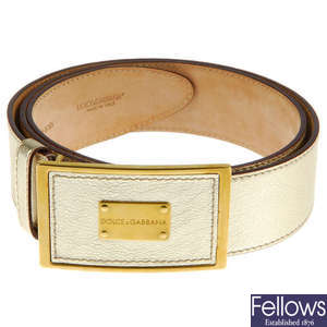 DOLCE & GABBANA - a metallic leather belt.