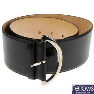 CHRISTIAN DIOR - a wide black leather belt.