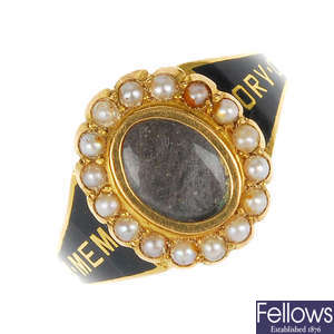 An 18ct gold early 20th century enamel and split pearl memorial ring.