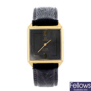 OMEGA - a lady's gold plated De Ville wrist watch together with two other watches.
