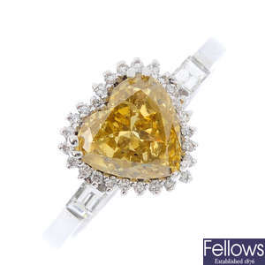A Fancy Deep Brownish Yellow diamond and diamond cluster ring.