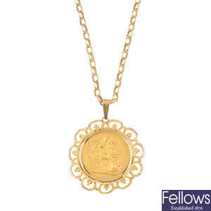 A 9ct gold sovereign pendant, with chain.