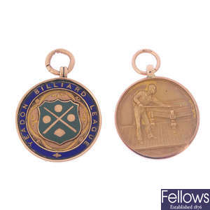Two early 20th century 9ct gold billiard medallions.