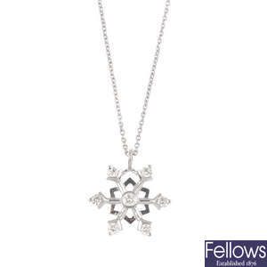 A diamond snowflake pendant, with 18ct gold chain.