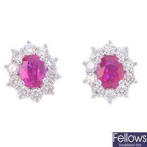 A pair of ruby and diamond cluster earrings. 