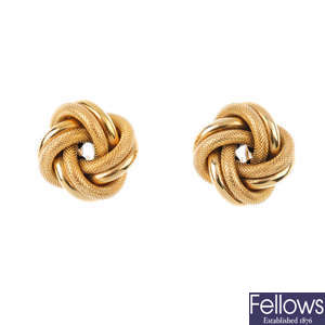 A pair of knot earrings. 