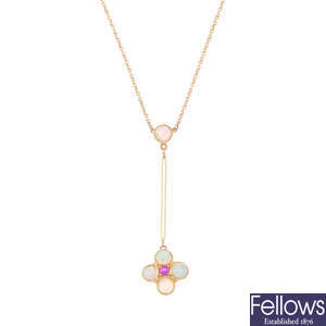 An early 20th century 15ct gold gem-set pendant, on a chain.